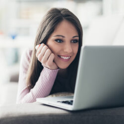 Girl-watching-movies-on-a-computer-HD-picture